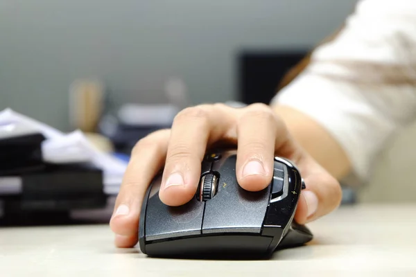 female hand on mouse computer