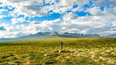 people at rondane national park Norway clipart
