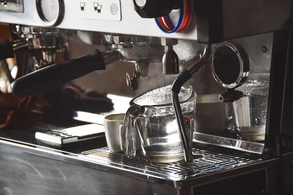 coffee machine making coffee in cafe