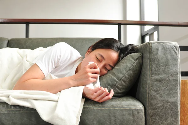 Asian Woman Sick and flu — couch, tired - Stock Photo | #228116558