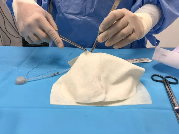 Surgeon Wearing Gloves Suturing Together Prosthesis Insert Implant Showing Surgical — Stock Photo, Image