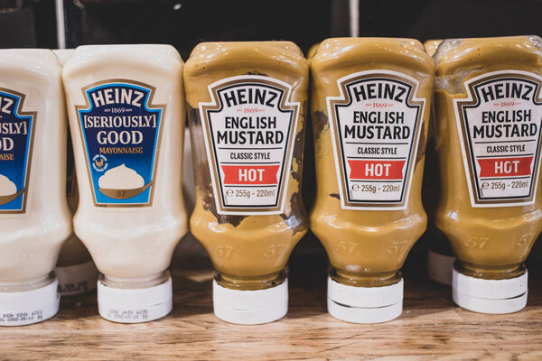 Luton Airport, Bedforsdshire, United Kingdom. 13 April 2019. Bottles of Heinz sauces on display London's Luton airport restaurant for consumption by travellers.