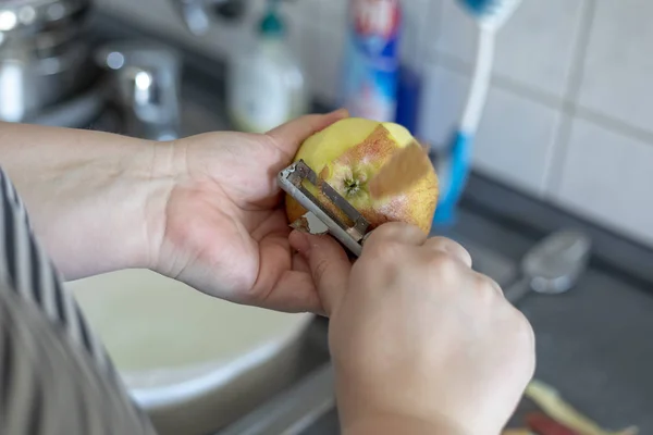 Hands Peeling Cooking Apple Grey Background — Stock Photo, Image