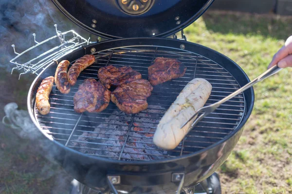 Grilling time! Grill, garden, green grass and good weather