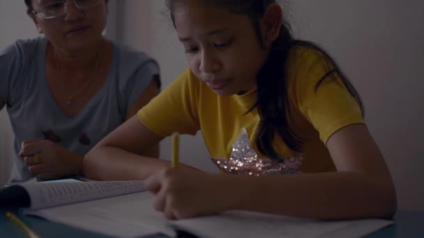 Mother Teaching Homework Her Daughter Desk Education Concept — Stock Video