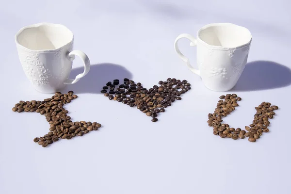 Kaffeebohnen Tassen Und Blattdekoration — Stockfoto