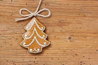 Gingerbread çerezleri vintage ahşap kahverengi arka plan kopya alanı ile üstten görünüm