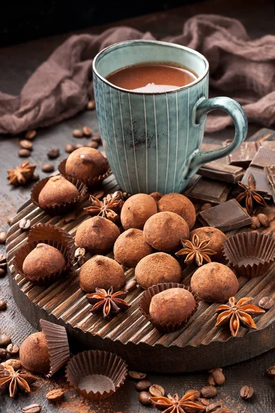 Hot chocolate mug with truffles candy — Stock Photo, Image