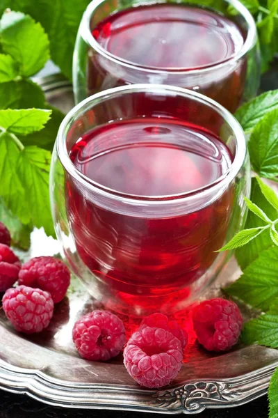 stock image Raspberry beverage with berries, selective focus