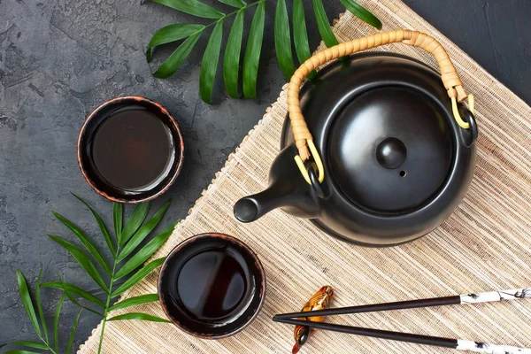 Chinese style  teapot on bamboo  background — Stock Photo, Image