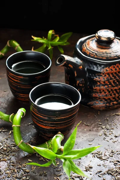 Asijská čajová sada na kamenné pozadí — Stock fotografie