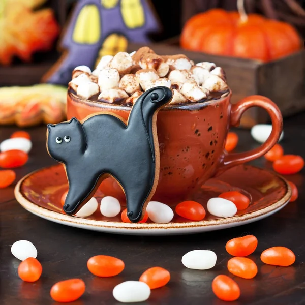 Halloween time composition with cookies and hot chocolate mug — Stock Photo, Image