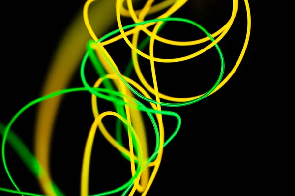 Желтый неон и зеленый неон абстрактны. Неоновые линии . — стоковое фото