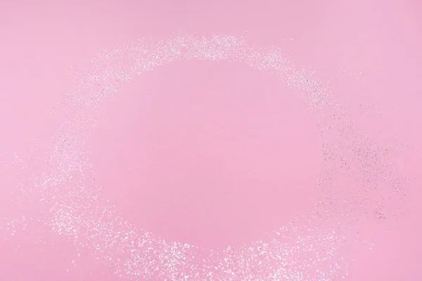 Fundo festivo pastel rosa com brilhos . — Fotografia de Stock