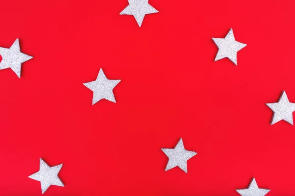 Pattern stars on red background. Christmas or New Year decoration background. — Stockfoto