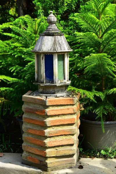 The Wooden Lighting Lamp in the garden