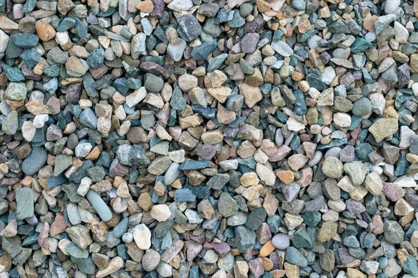 Crushed stone texture, multi color small stone, background