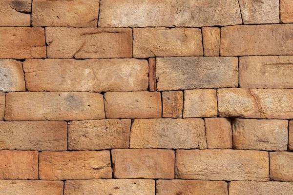 Texture of the old masonry walls made of natural stones and bricks