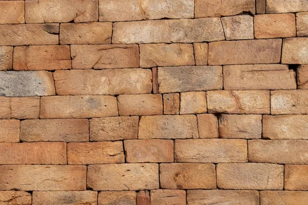 Texture of the old masonry walls made of natural stones and bricks