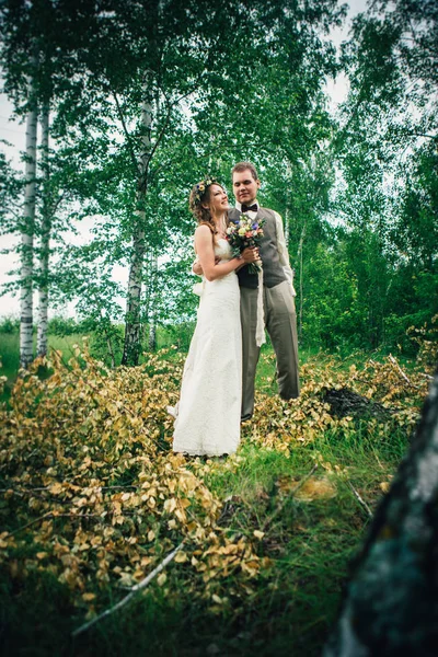 Young bride and groom in the style of provence.