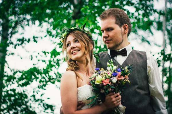 Young bride and groom in the style of provence.