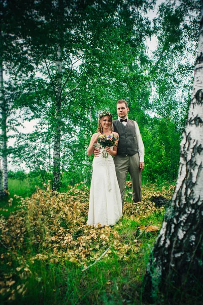 Young bride and groom in the style of provence.