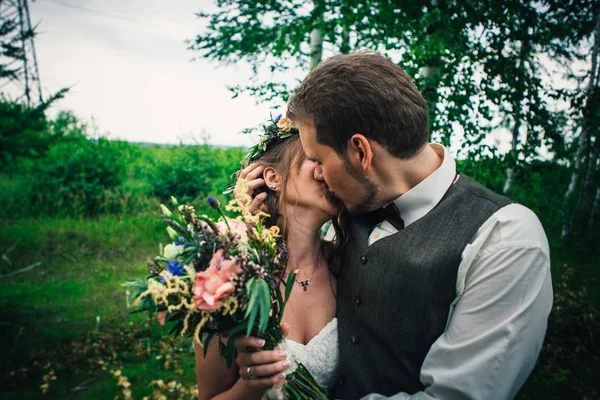 Young bride and groom in the style of provence.