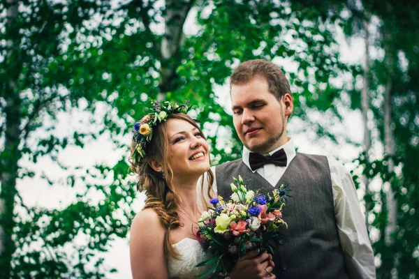 Young bride and groom in the style of provence.