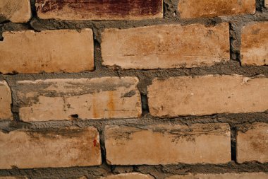 koyu portakal bej tuğla çimento yakın çekim ile.