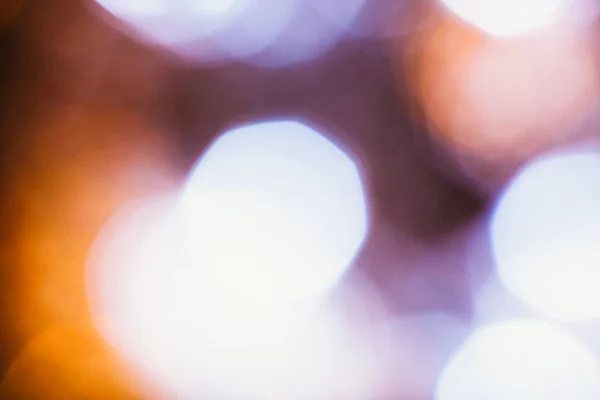 Large gold and silver bokeh on a dark background — Stock Photo, Image