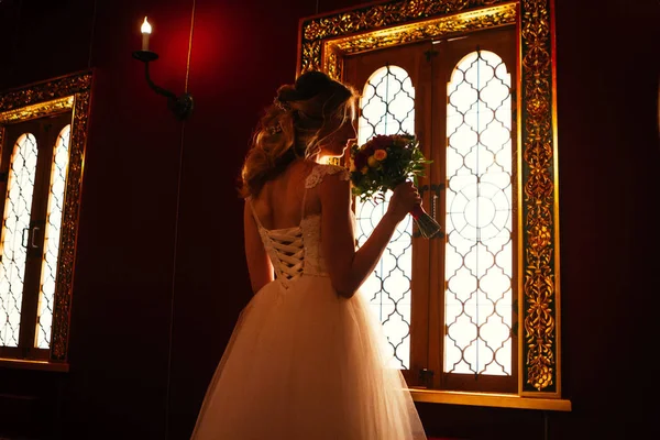 Portrait young beauty bride near the window — Stock Photo, Image