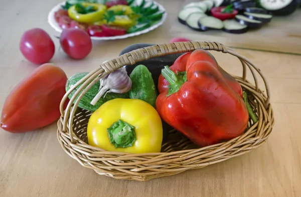 Table Wicker Basket Red Yellow Pepper Cucumbers Garlic Eggplant Next — Stock Photo, Image