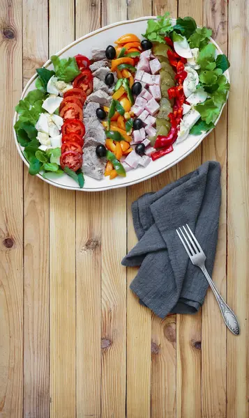 Cobb salad on the table on a platter. — Stock Photo, Image