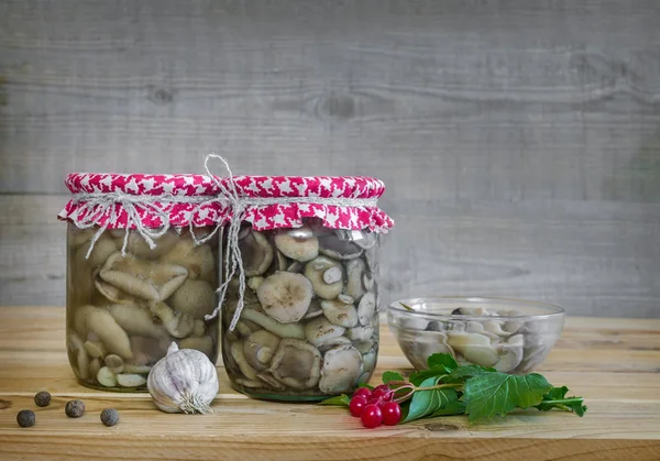 Home canning: marinated mushrooms in glass jars