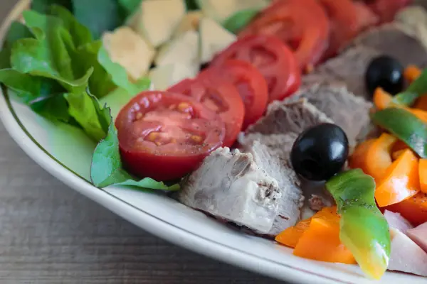 Cobb salad on the table on a platter. — Stock Photo, Image