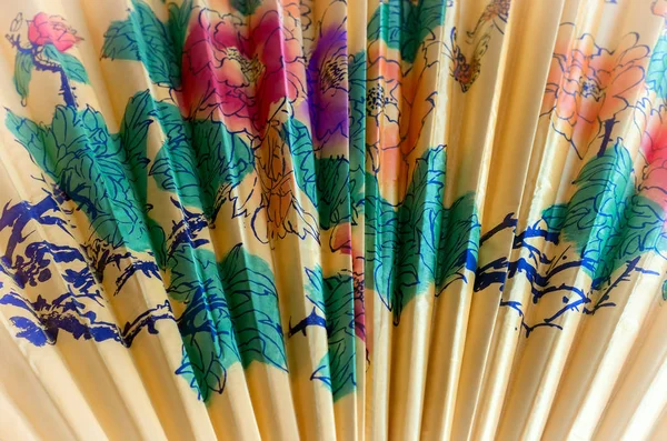 Fragment of a fan in the Japanese style — Stock Photo, Image