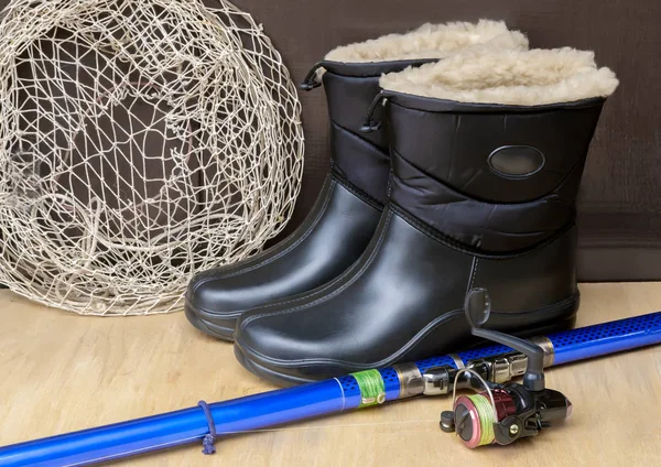 Waterproof shoes and fishing gear for fishing. — Stock Photo, Image