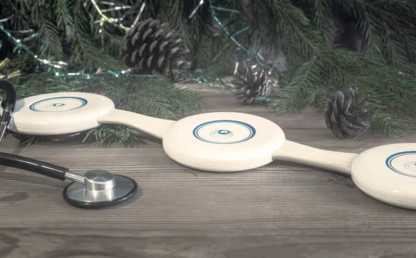 理学療法装置 聴診器 クリスマスの装飾付きの医療ポスター ガーランド おもちゃ コピースペース 薬のクリスマス — ストック写真