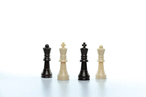 Group of Chess figure kings and queen on white background, isolated