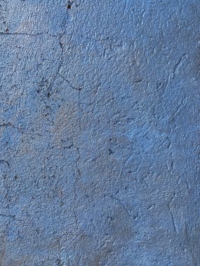 Olaysız mavi yeni boyanmış çimento duvar arkaplanı
