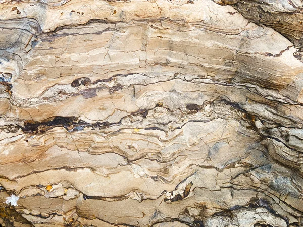 Dalga desenli kahverengi taş arkaplan