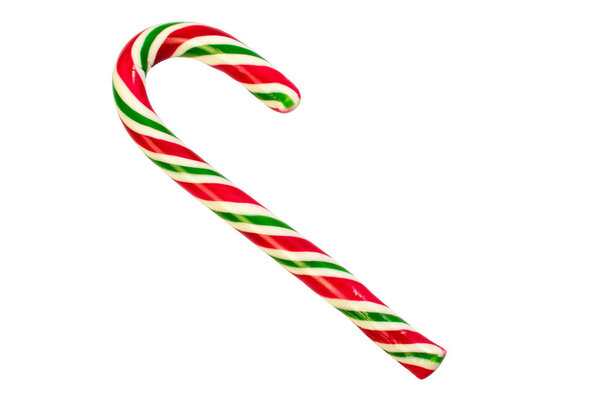The traditional symbol of Christmas and New Year is a candy cane. Lollipop stick with red white and green swirling stripes on a white background.