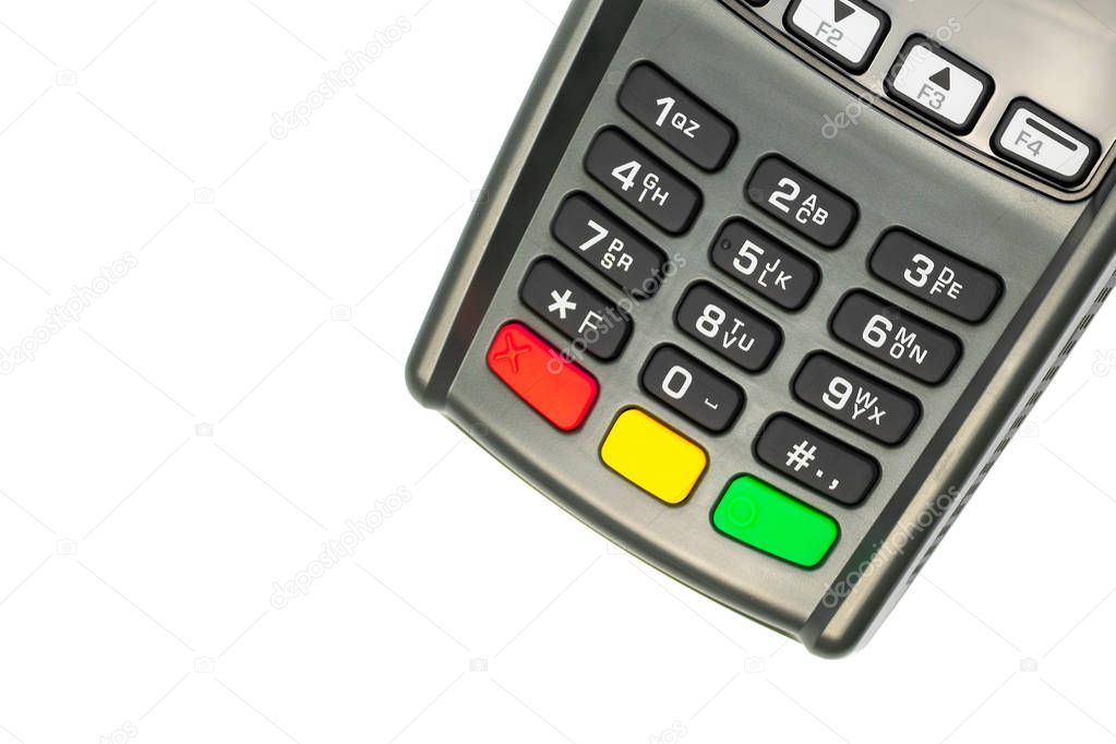 Credit card POS terminal gray keypad isolated on white background. A device for conducting financial transactions with customers. Close up of a cut off contactless payment device, card machine.