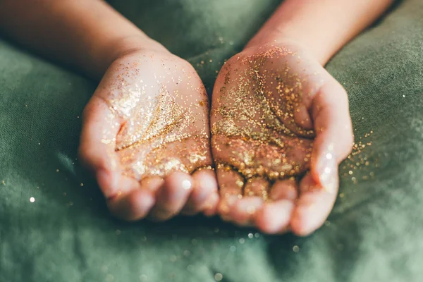 Girl Hands Holding Golden Glitter Green Linen Fabric Selective Focus — Stock Photo, Image
