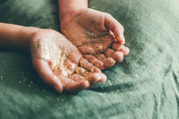 Girl Hands Holding Golden Glitter Green Linen Fabric Selective Focus — Stock Photo, Image