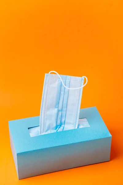 Disposable Blue Face Mask Box Orange Background Minimal Composition — Stock Photo, Image