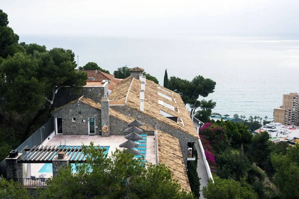 Beautiful villa against the backdrop of the Mediterranean is immersed in spring flowers. Malaga, Spain, Andolusia. — Φωτογραφία Αρχείου