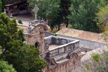 The amazing monastery of Santuari de Lluc (Santuario de Santa Maria de Lluch) is a Catholic monastery on the island of Mallorca. Holy place, the spiritual center of Mallorca, Balearic Islands, Spain. clipart