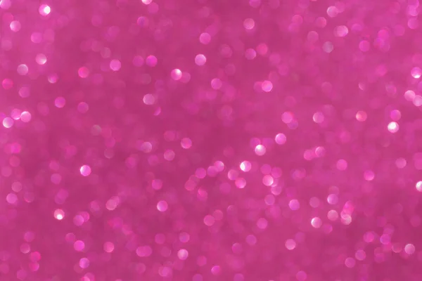 Soyut, parlak, pembe, bulanık arkaplan. Noel ve Yeni Yıl tatili.