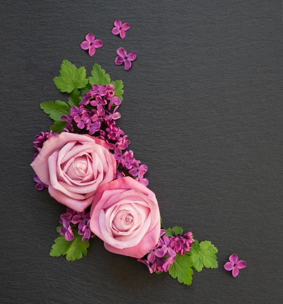 Decorative Composition Consisting Pink Roses Violet Lilac Flowers Green Leaves — Stock Photo, Image
